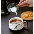Miniatyrbilde 4 av 5: Porselen tekopp og kaffekoppsett for ettermiddagste - Marmormønster (kort 302 ml + treskål)