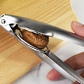 Miniatyrbillede 2 af 5: Rustfrit kastanjeklipsåbner Kreativ hjemmekastanjeklipsåbner Kryds kastanjeklips Nød