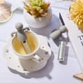 Miniatyrbillede 2 af 5: Sæt med humanoid tefilter, tekande i rustfrit stål, timeglas, tesæt, grå tekande