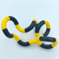 Miniatyrbillede 3 af 5: Tangle Toys, 10 stk. Sorte og røde Twist Gadgets, Hånd Gadgets
