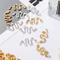 Miniatyrbillede 5 af 5: Guld/Sølv - Pakke med 10 slange neglekunst charms med rhinsten,