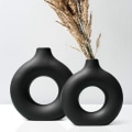 Miniatyrbillede 2 af 5: Sort Keramisk Vase Nordisk Cirkulær Mat Hul Donut Blomst