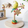 Miniatyrbild 5 av 5: Fågelpinne Ställ Pinne Leksak för Sparv Roterande Väderkvarnsdesign Fågelklo Slipställ för Cockatiels Macaws