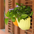 Miniatyrbillede 2 af 5: Vægophængt blomsterkurv i plastikharpiks til opbevaring af vand, boligindretning og have Orange L