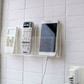 Pikkukuva 1 / 4: Akryylinen seinäteline matkapuhelimelle ja kaukosäätimelle - 3 lokeroa