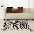 Miniatyrbild 2 av 4: Matta i läderimitation med zebra/ko/get-tryck - Naturlig heminredning - 110x75 cm