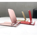 Miniatyrbild 5 av 6: Halkfri Gummikudde Ställ för Smartphones & Tablets, Portabel Design med Hållbar Aluminiumbas, 360 Graders Rotation för Optimal Visning
