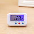 Miniatyrbild 2 av 4: Digital Small LCD Watch with Date Alarm Stop Snooze Night Light Table Clock Kitchen-