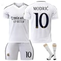 Miniatyrbillede 1 af 2: 2425 Real Madrid Fodboldtrøje Nr. 7 Vinicius 5 Bellingham Nr. 9 Mbappe og andre fodboldtrøjesæt til voksne og børn No.10 MODRIC M