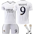 Miniatyrbillede 1 af 2: 2425 Real Madrid Fodboldtrøje Nr. 7 Vinicius 5 Bellingham Nr. 9 Mbappe og andre fodboldtrøjesæt til voksne og børn No.9 MBAPPÉ 26
