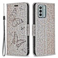 Pikkukuva 1 / 5: Nokia G22 Perhoskuvioitu Lompakkokotelo Jalustalla, Nahkainen Puhelinkotelo Hihnalla Grey