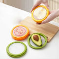 Miniatyrbillede 3 af 5: 4 stk. Avocado Saver og Tomatholder Frugt Crisper Madopbevaringsbeholdere Multifunktionelle Frugt Grøntsagsbeskyttere til Citroner Tomater Hvidløg
