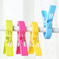 Miniatyrbild 3 av 5: Strandhandduksklämmor Vindtäta Klämmor för Handdukar Täcken Badhanddukar Filtar Kläder Strandhanddukar Dukar Plastklädnypor (4-pack)