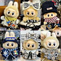 Miniatyrbillede 4 af 5: Sommerudsalg Labubu dukketøj første generation anden generation blind box Labubu dukketøj (pandebånd + overalls + tørklæde) Grönt rutnät