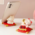 Miniatyrbild 1 av 2: Lyckokatt Smartphone Stativ Söt Handsfree Funktionell för Bilinstrumentbräda Hem Kontor Skrivbord Lycka