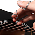 Miniatyrbild 5 av 5: 4 st Fjärilsformade Gitarrplektrum Fingerplektrum Tumplektrum Portabla Justerbara Legerings Finger Tumplektrum Gitarrtillbehör för Gitarrbas (Si