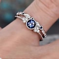 Miniatyrbillede 2 af 5: Kærlighedsringe Vielsesringe 2 stk./sæt Kvinder Cubic Zirconia Indlagt Stabelbar Fingerring Bryllupssmykker Gave - Blå US 7
