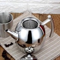 Miniatyrbillede 2 af 4: Olivenbeholder - INN® - 1L - Rustfrit stål - Ergonomisk - Poleret design