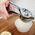 Miniatyrbillede 1 af 4: Citruspresser - Manual - Rustfrit Stål 304 - Ergonomisk - 400G - Opvaskemaskinevenlig som indikerat