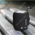 Miniatyrbillede 2 af 3: TD® Trådløs Bluetooth-højttaler i sort cylindrisk design med hvide knapper til udendørs brug, vandtæt mini-højttaler i stof, bærbar.
