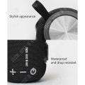 Miniatyrbillede 3 af 3: TD® Trådløs Bluetooth-højttaler i sort cylindrisk design med hvide knapper til udendørs brug, vandtæt mini-højttaler i stof, bærbar.