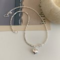 Miniatyrbild 4 av 5: ##/Halsband i metall för kvinnor##/