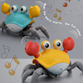 Miniatyrbillede 2 af 6: ##/Elektrisk automatisk induktion krabbe legetøj, lys og musik, orange##/