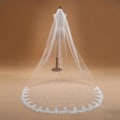 Miniatyrbild 2 av 5: Brudslöja, lång, elfenbensvit, golvlång, 3 m, elegant, enkel