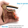Pikkukuva 3 / 5: Kitara Capo 5 Plektrillä (Alkuperäinen Puuväri) - 75 * 80 mm, Alloy Gui