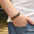 Miniatyrbillede 5 af 5: Sort guld farvet rustfrit stål justerbart armbånd 21,5 cm