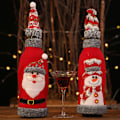 Miniatyrbild 3 av 5: ##/x Julvinflaskeöverdrag, inslagna i grå flanell i s##/