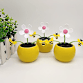 Miniatyrbillede 1 af 2: Solcelledrevet dansende legetøj Bobblehead Solcelledansende blomster bier legetøj, sød vindues- og bildashboard