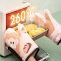 Miniatyrbillede 1 af 5: Et par varmeisolerende handsker, et par anti-skoldningshandsker,
