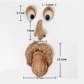 Miniatyrbild 2 av 5: Träd ansikte utomhus staty gammal man träd kramar bark grimas