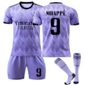 Miniatyrbilde 1 av 2: 2022-23 Real Madrid Bortebarnedrakt Fotballsett Nr. 9 Mbappé Kids 16(90-100cm)