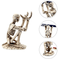 Miniatyrbillede 5 af 5: Kranium Penneholder Skelet Blyantholder Beslag Harpiks Kreativ Desktop Springvand Pen Opbevaringshylde Organizer Makeup Pensel Display Stativ Til Halloween Ho