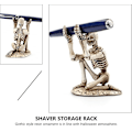 Miniatyrbillede 2 af 5: Kranium Penneholder Skelet Blyantholder Beslag Harpiks Kreativ Desktop Springvand Pen Opbevaringshylde Organizer Makeup Pensel Display Stativ Til Halloween Ho