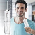 Miniatyrbilde 2 av 5: Bærbar munnvannsapparat 3 moduser USB oppladbar 4 jet rosa
