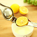 Miniatyrbillede 4 af 5: Håndholdt citronpresser i rustfrit stål