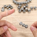 Miniatyrbild 3 av 5: 40 stycken silverfärgade distanspärlor - ihåliga pärlor för smyckestillverkning