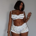 Miniatyrbillede 1 af 3: Bedst sælgende nyt mode sexet strop tube top slank pasform plisseret shorts sæt til kvinder white S