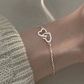 Miniatyrbilde 1 av 7: Minimalistisk Dobbel Interlåst Hjerte Armbånd Fint Smykke