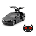 Pikkukuva 1 / 4: Uusi vuosi Joulu 4-ovinen Tesla kaukosäädöllä auto lasten lelu joululahja