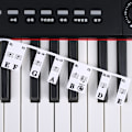 Pikkukuva 11 / 11: 61-näppäimen ja 88-näppäimen irrotettavat musiikkisovittimen tarrat numeroitujen nuottien ja piano-ohjaimen merkinnöillä 0.06 88 keys