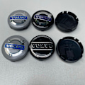Miniatyrbillede 4 af 4: x Volvo alufælge, navkapsler, 64 mm, sort/blå, C70, S60, V60, V70, S80, XC90