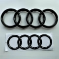 Miniatyrbilde 1 av 2: AUDI GLOSS BLACK MERKEEMBLEM RINGE FORAN & BAK A1 A3 A4 A5 273MM 192MM