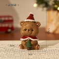 Julhartsfigurset med presentförpackning, tomte, snögubbe och renar som bordsdekoration för julklappar Christmas bear