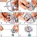 Miniatyrbild 2 av 4: Metallisk Gyroskop Anti-gravitation Snurra Topp Gyroskop Balans Leksak Pedagogisk Gåva Färgrik (FMY)