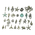 Miniatyrbilde 1 av 2: 56 stk. Konkylie Hoop Ørepynt Labret Smykker Metall Charm Kolleksjon Metall Charms Anheng Marine Dyr Charm Anheng