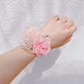 Miniatyrbillede 1 af 9: Piger Brudepige Håndledsblomster Perle Rhinestones Rose Armbånd Stof Håndblomster 3
